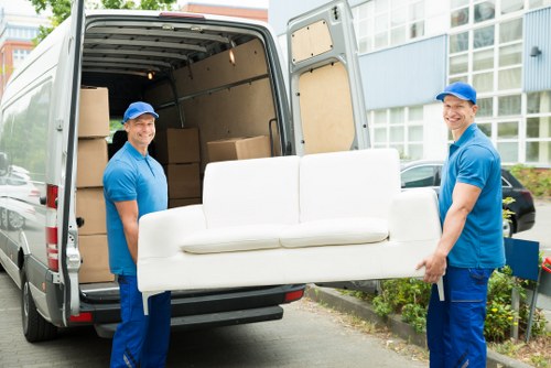 Moving van and boxes for a home move in Ponders End
