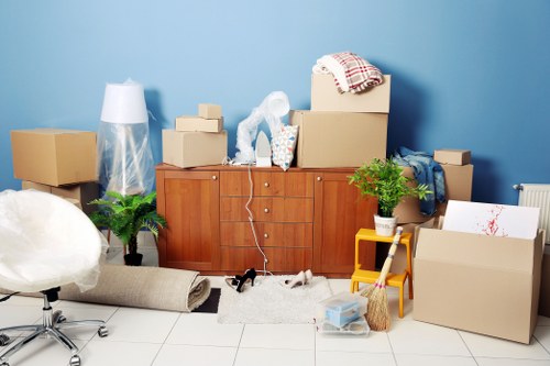 Loading household items into a removal van in Ponders End