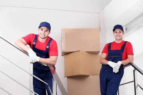 Office relocation planning in Ponders End with moving boxes and furniture